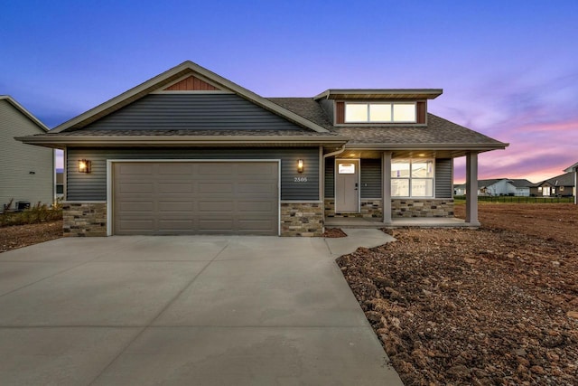 view of front of home with a garage