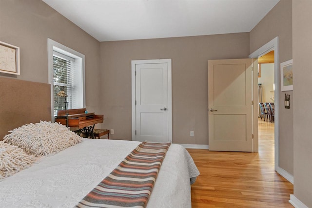 458 Pro Trl, Nekoosa, WI 54457 - bedroom featuring light wood finished floors and baseboards