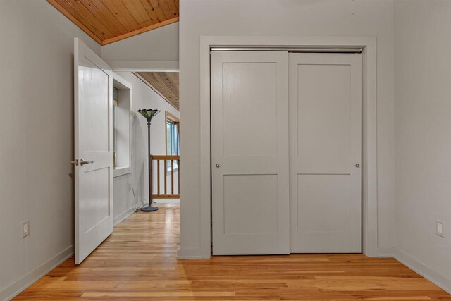 458 Pro Trl, Nekoosa, WI 54457 - hall with light wood-type flooring, vaulted ceiling, and wooden ceiling