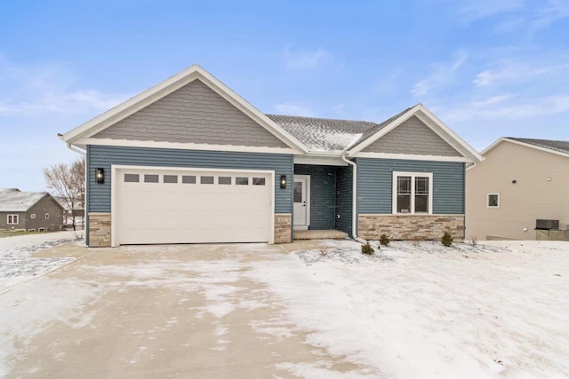 craftsman-style home with a garage