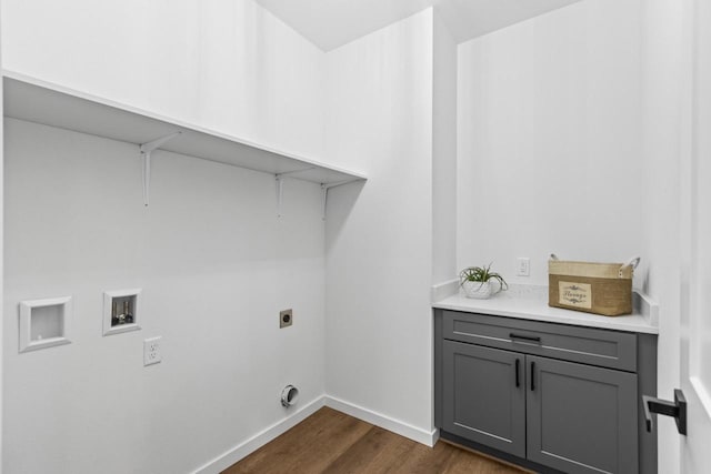 laundry area with electric dryer hookup, dark wood-type flooring, and washer hookup