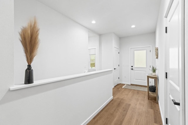 hallway featuring light hardwood / wood-style flooring