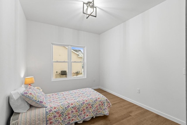 bedroom featuring hardwood / wood-style floors