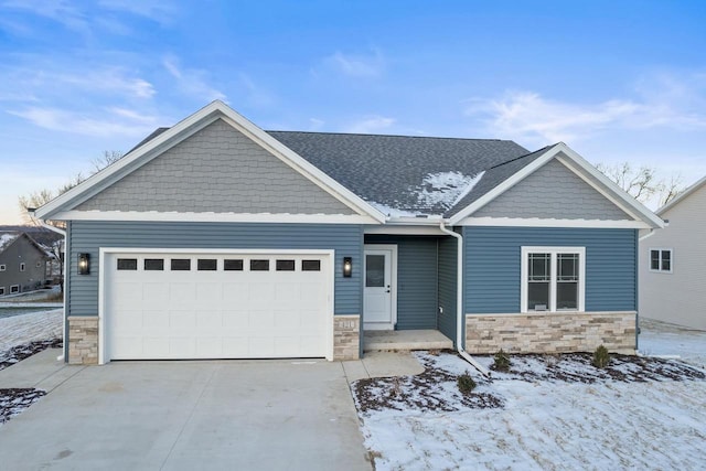 craftsman-style house featuring a garage