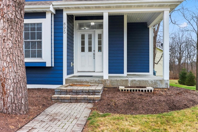 entrance to property with a porch