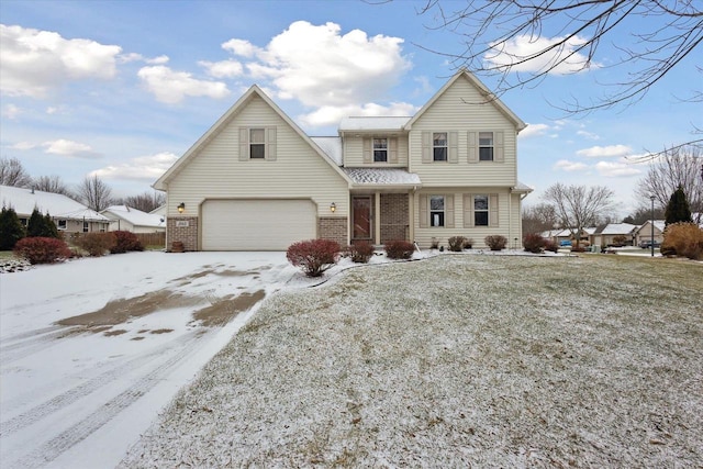 front of property with a garage