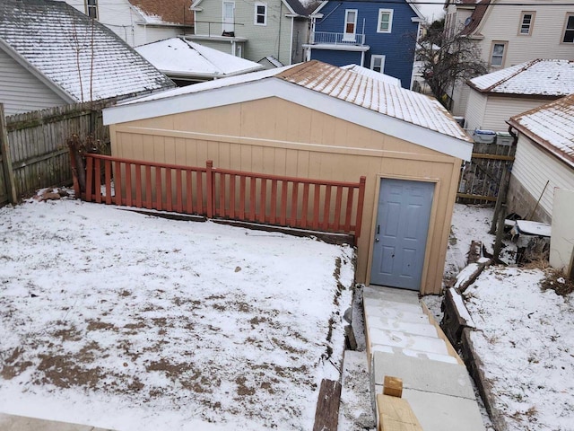 view of snow covered garage