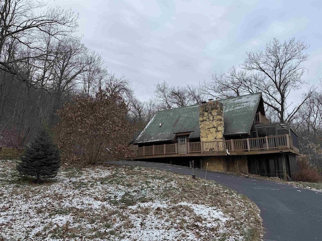 7409 Timberline Trl, Arena, WI 53503 - view of side of property featuring a chimney and a deck