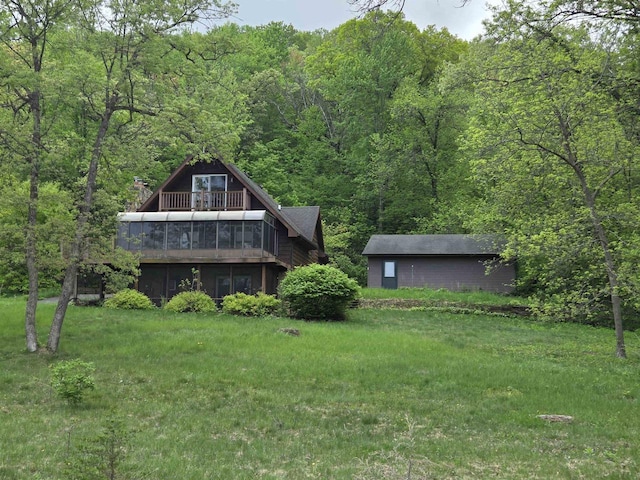7409 Timberline Trl, Arena, WI 53503 - back of property featuring a wooded view and a deck