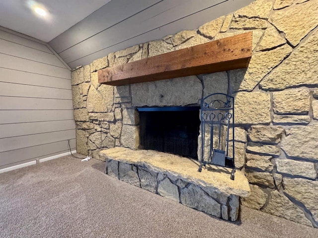 7409 Timberline Trl, Arena, WI 53503 - detailed view of carpet floors, a stone fireplace, and wood walls