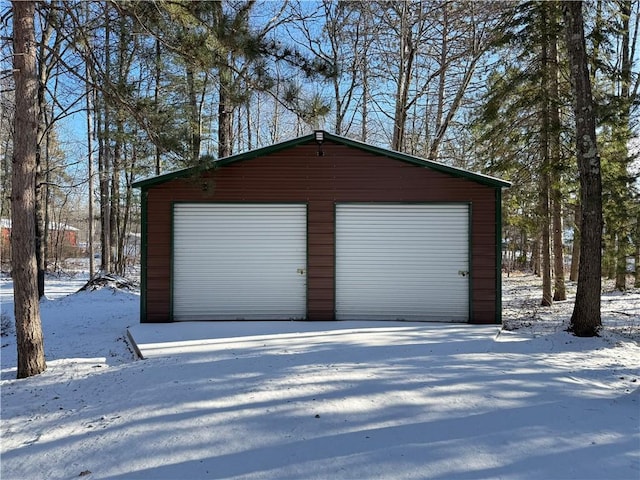 view of snow covered garage