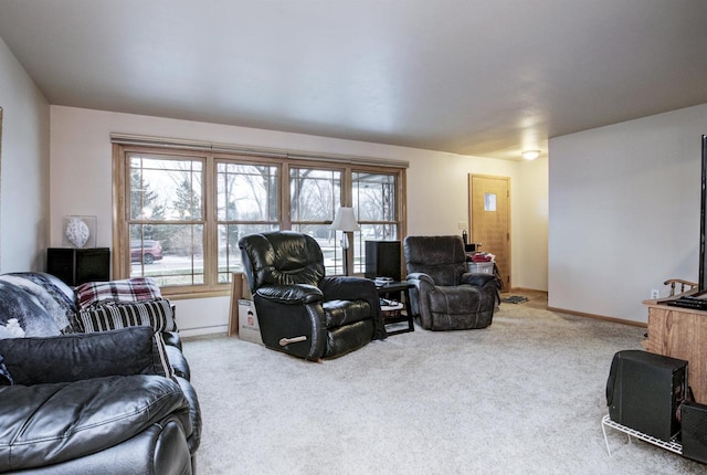 living room with carpet flooring and plenty of natural light