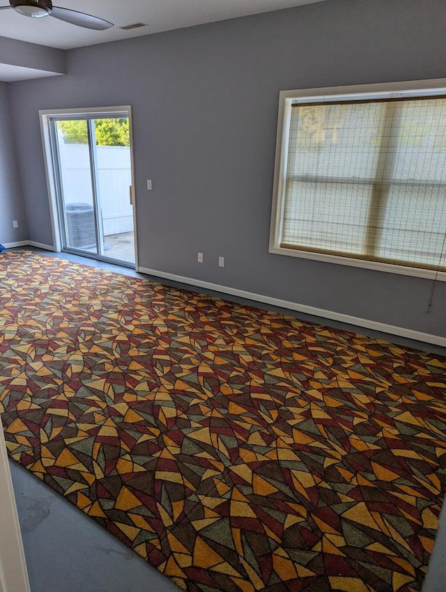 empty room featuring ceiling fan