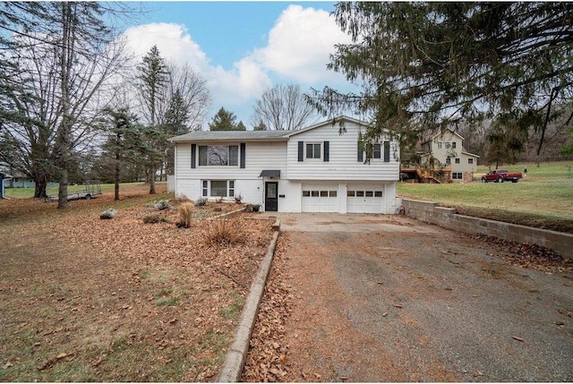 raised ranch featuring a garage