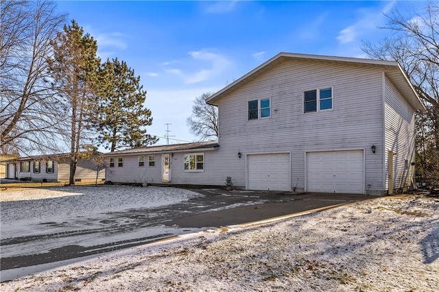 view of front of home with a garage