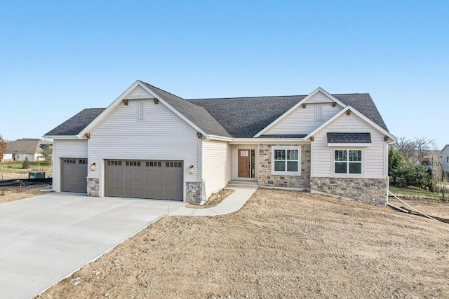 craftsman inspired home featuring a garage