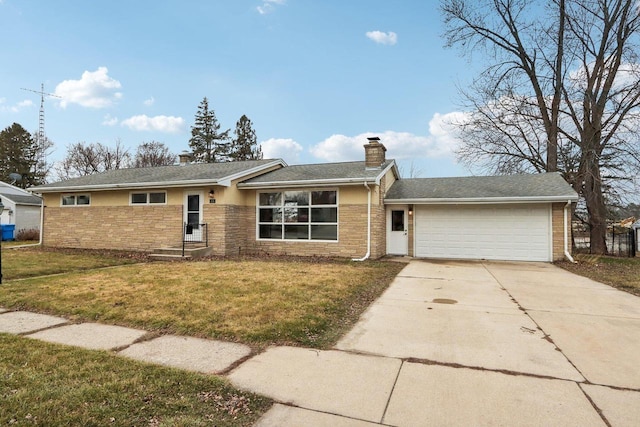 ranch-style home featuring a garage and a front lawn