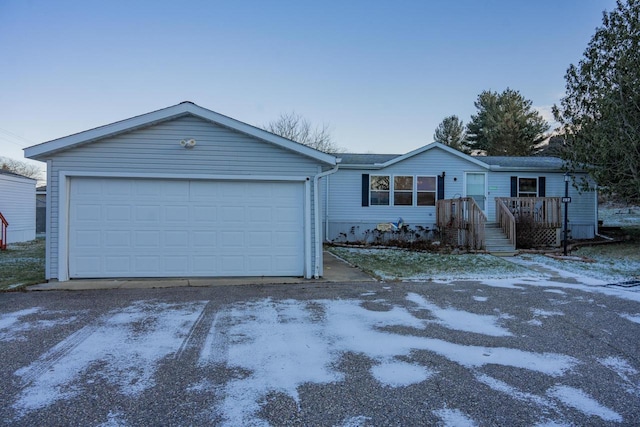 ranch-style house featuring a garage