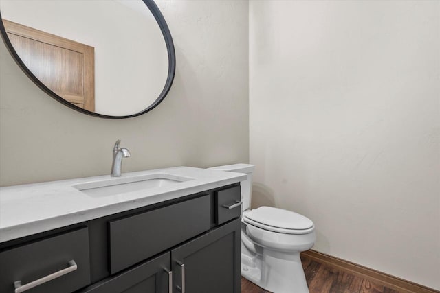5550 N Amethyst Dr, Appleton, WI 54913 - bathroom featuring vanity, hardwood / wood-style flooring, and toilet