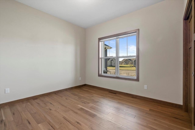5550 N Amethyst Dr, Appleton, WI 54913 - empty room with light hardwood / wood-style flooring