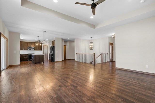 5550 N Amethyst Dr, Appleton, WI 54913 - unfurnished living room with ceiling fan and dark wood-type flooring