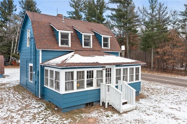 view of snow covered property