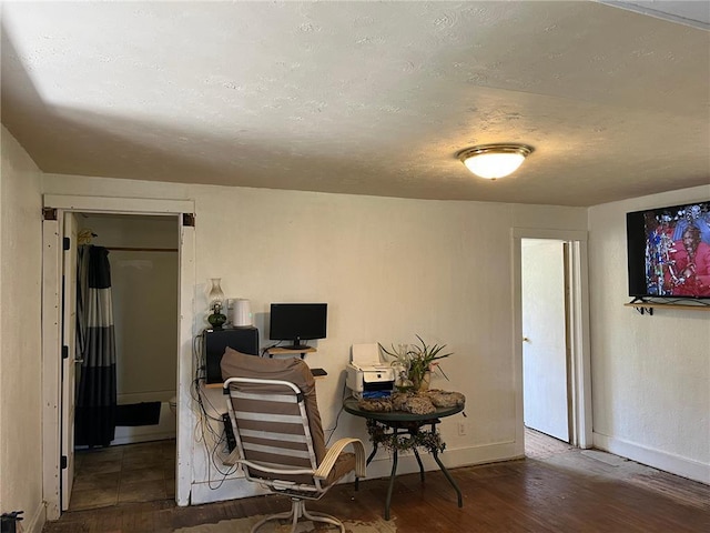 office space with dark hardwood / wood-style floors