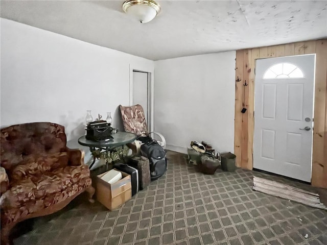 view of carpeted entrance foyer