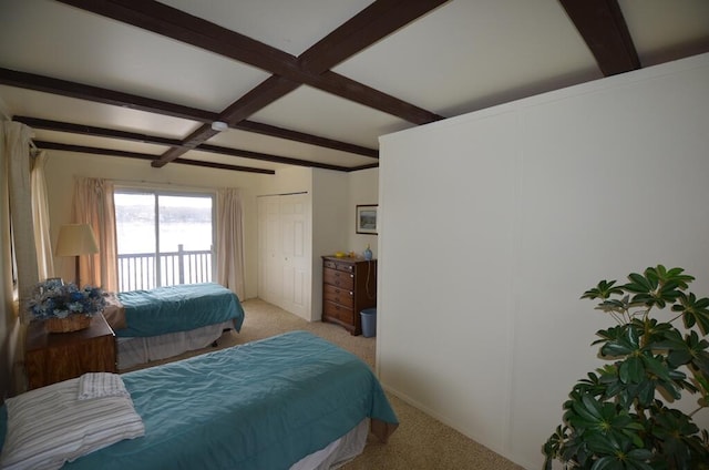 carpeted bedroom with beam ceiling and coffered ceiling