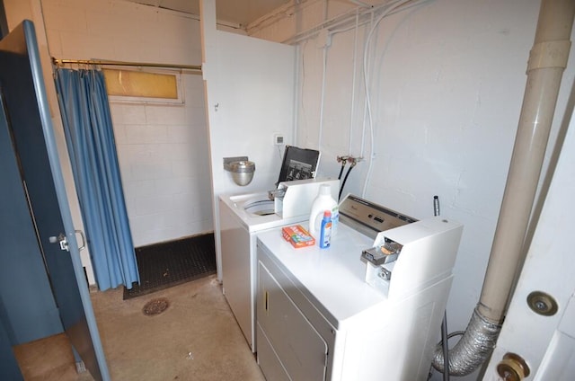 laundry area with washer and dryer