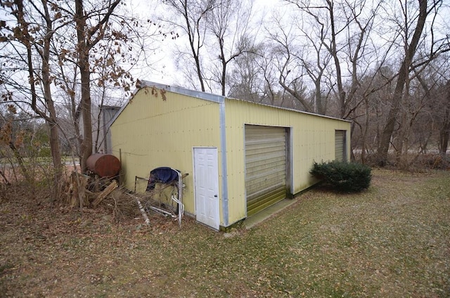 view of outbuilding featuring a garage