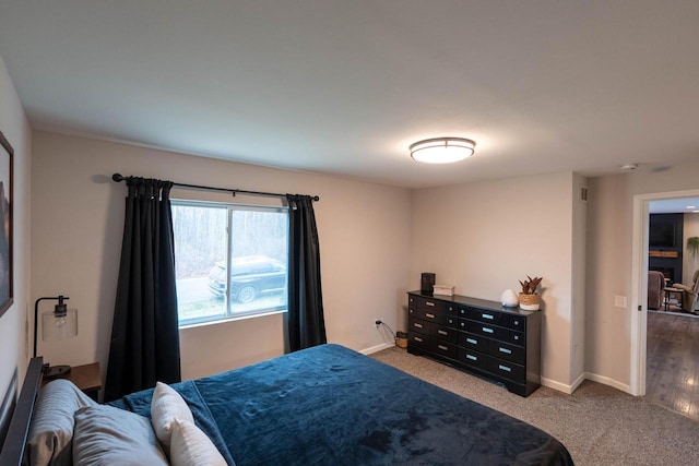 bedroom with light colored carpet