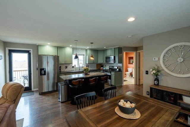 dining room with dark hardwood / wood-style floors