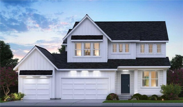 modern farmhouse featuring entry steps, a shingled roof, and board and batten siding