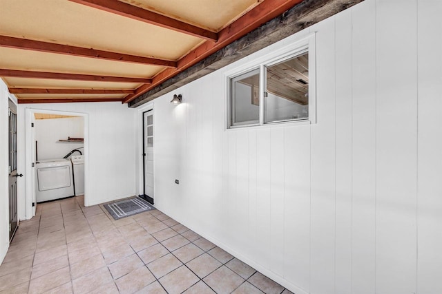 view of patio featuring washing machine and dryer