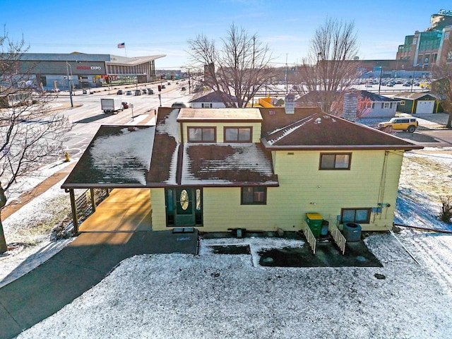 view of snow covered property