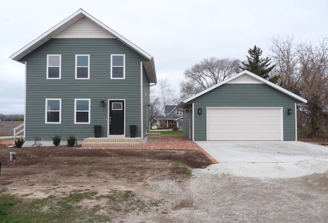 view of front of property with a garage