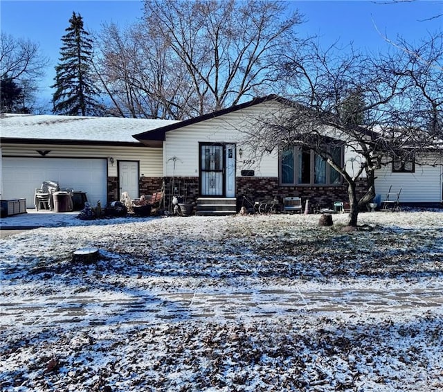 single story home featuring a garage