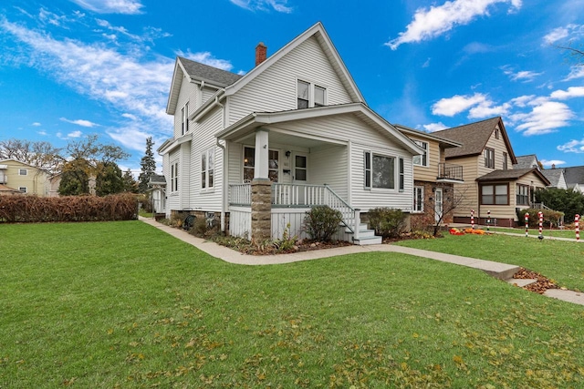 view of front of property featuring a porch and a front yard