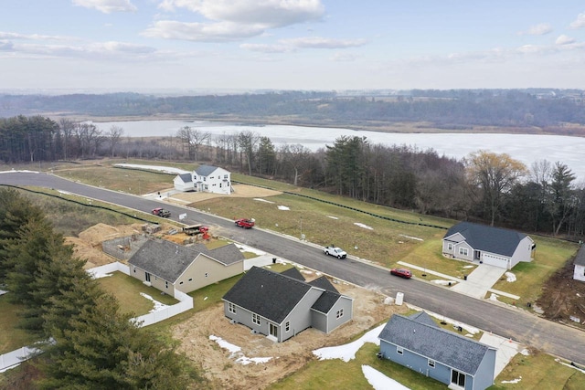 drone / aerial view with a water view