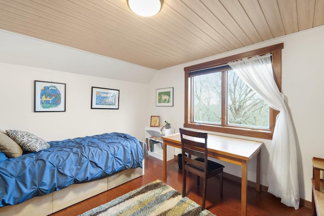 bedroom with wooden ceiling, dark hardwood / wood-style floors, and lofted ceiling