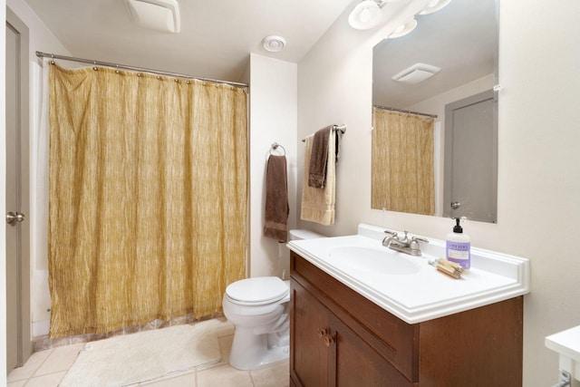 bathroom with a shower with curtain, tile patterned flooring, vanity, and toilet