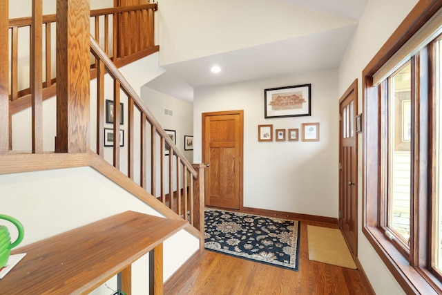 entrance foyer featuring wood-type flooring