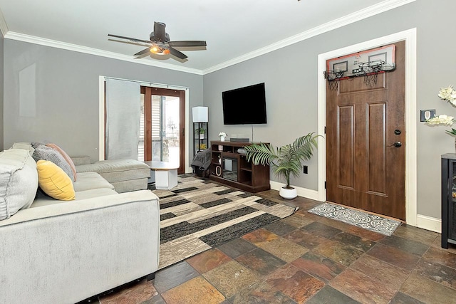 living room featuring ceiling fan and ornamental molding