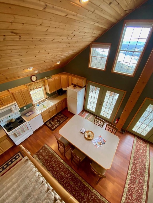 kitchen with tile counters, wooden ceiling, wood-type flooring, white appliances, and light brown cabinetry