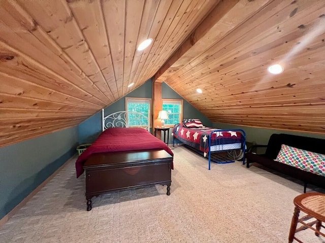 bedroom featuring carpet, wood ceiling, and vaulted ceiling