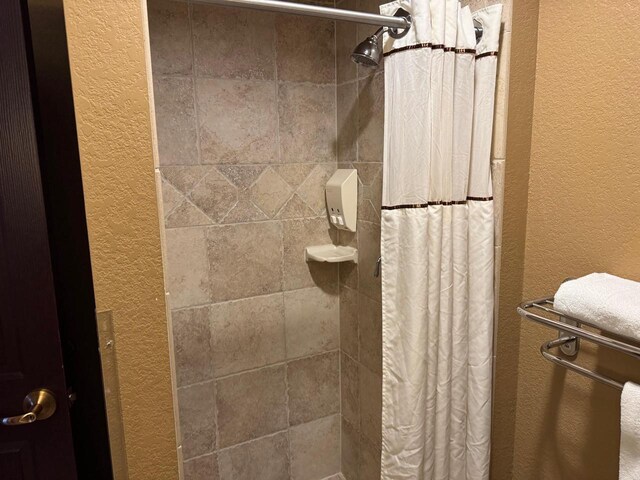 bathroom featuring walk in shower