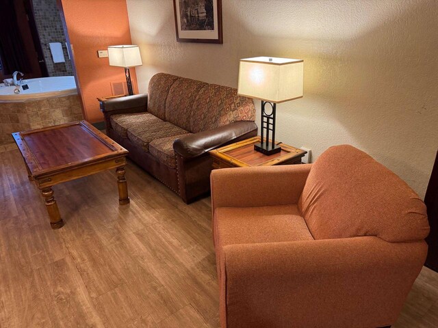 living room with hardwood / wood-style flooring