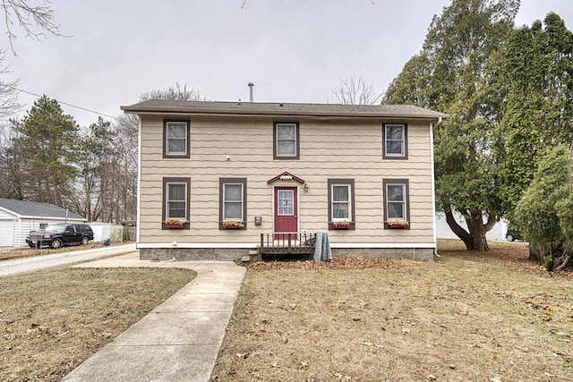 view of front of property with a front lawn