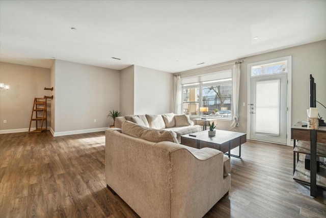 living room featuring dark wood-type flooring